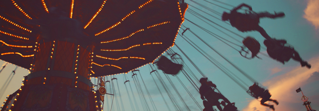 people son swing in summer fair