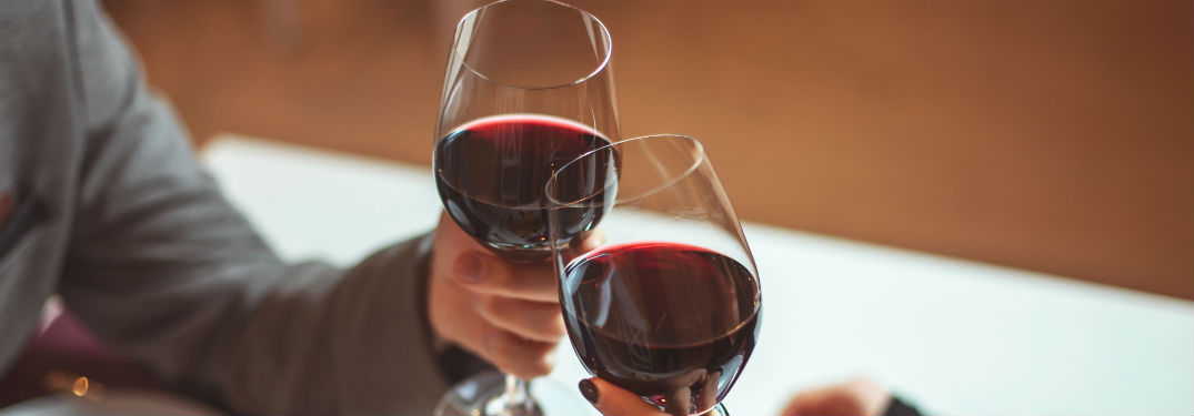 Couple with glasses of wine