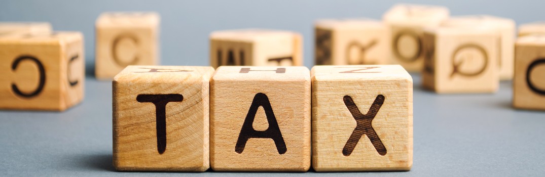 blocks spelling out the word 'tax'
