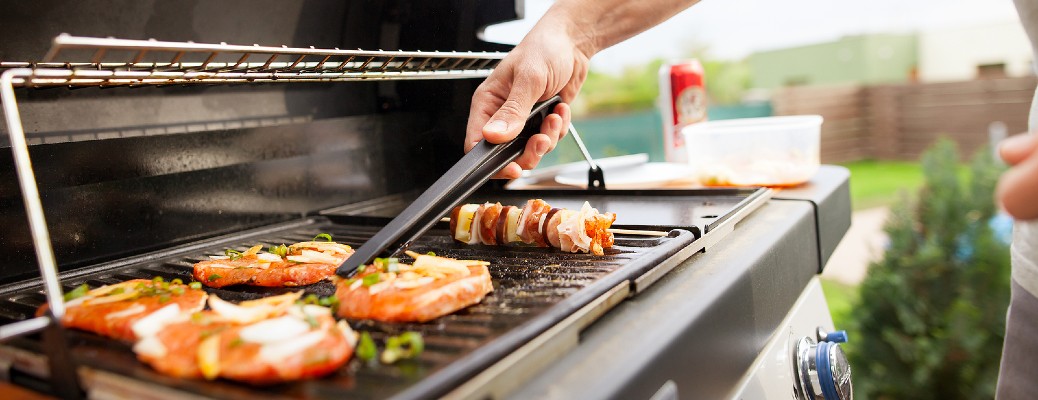 man grilling burgers