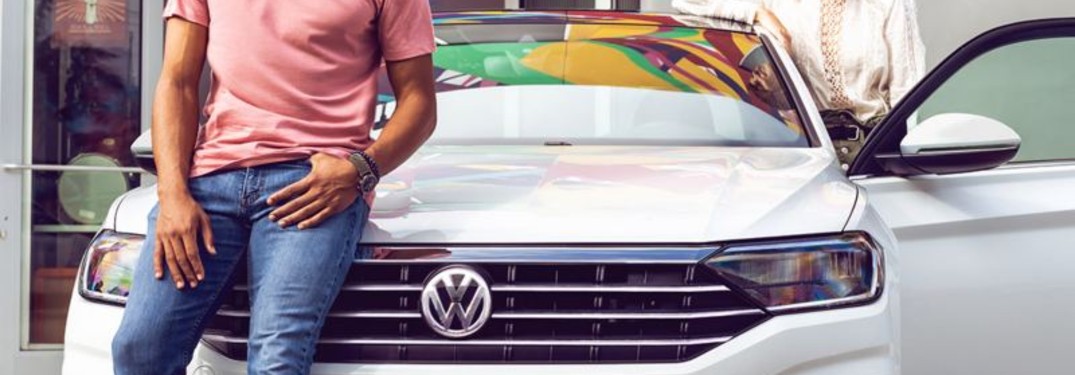 couple in the 2021 VW Jetta
