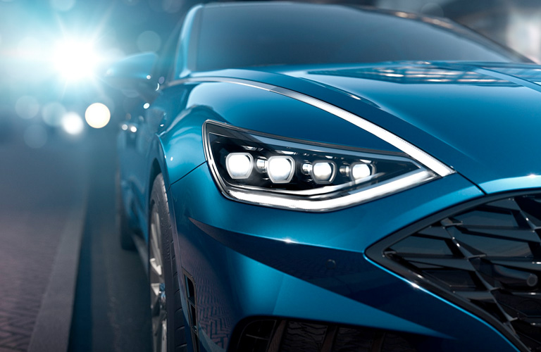 blue hyundai sonata headlight close up