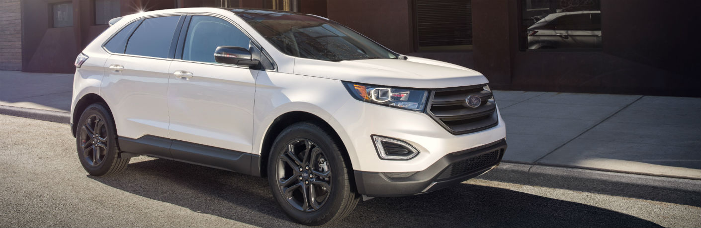 White 2018 Ford Edge driving down the highway