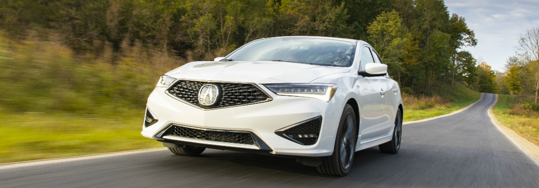 Driver's side front angle view of white 2020 Acura ILX