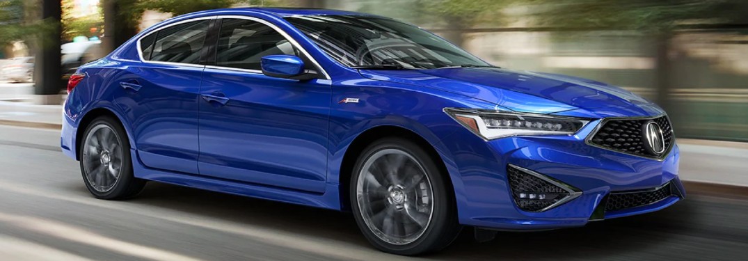 Passenger's side front angle view of blue 2020 Acura ILX