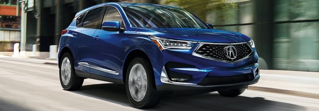 Blue 2021 Acura RDX on a City Street