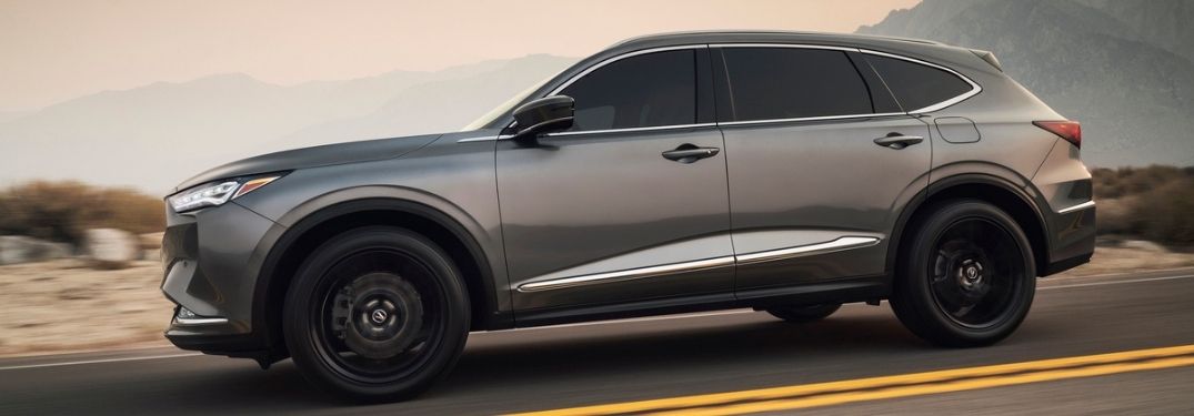 Gray 2022 Acura MDX Side Exterior on a Country Road