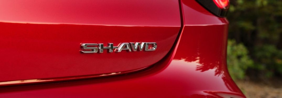 Close Up of Red 2021 Acura RDX Rear SH-AWD Badge