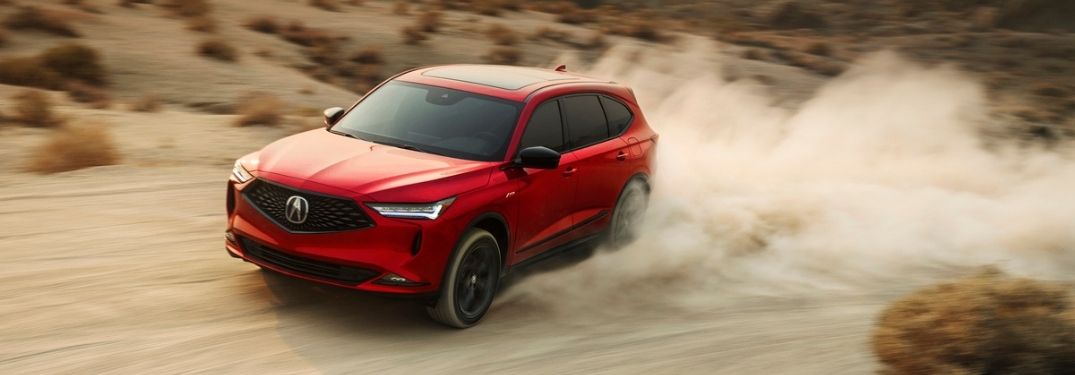 Red 2022 Acura RDX on a Dirt Trail