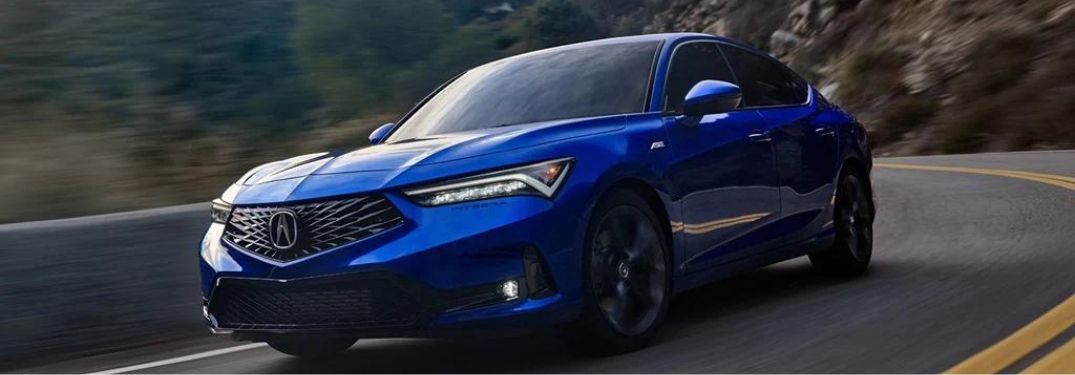 2023 Acura Integra Blue driving on the road