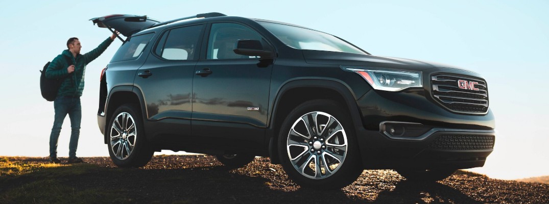 2019 GMC Acadia exterior outdoor man opening trunk