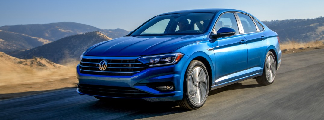 2019 Volkswagen Jetta exterior shot blue paint on road