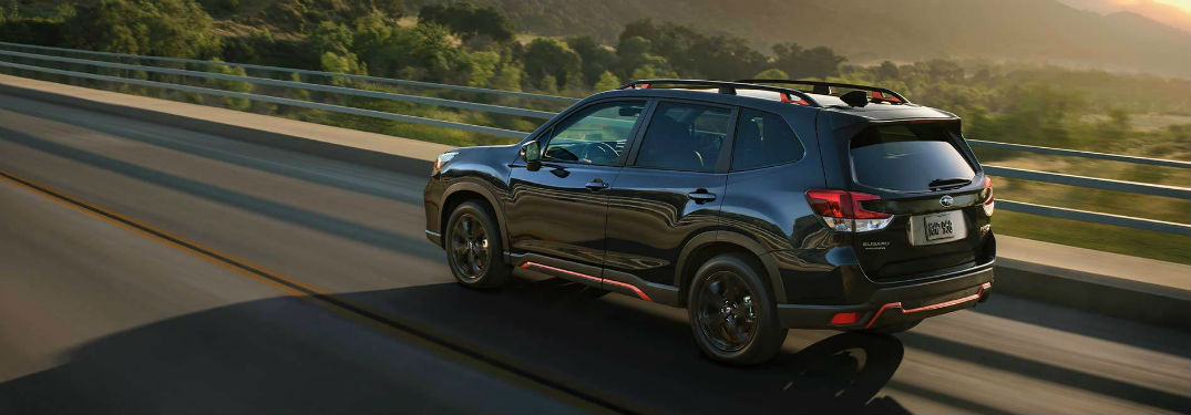 2020 Subaru Forester exterior back fascia and driver side going fast on blurred road