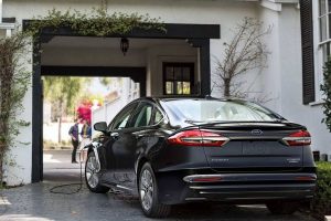 2020 Ford Fusion Plug-in Hybrid being charged from rear drivers side