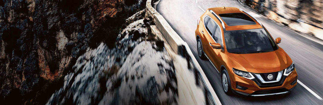 2020 Nissan Rogue driving through a mountain