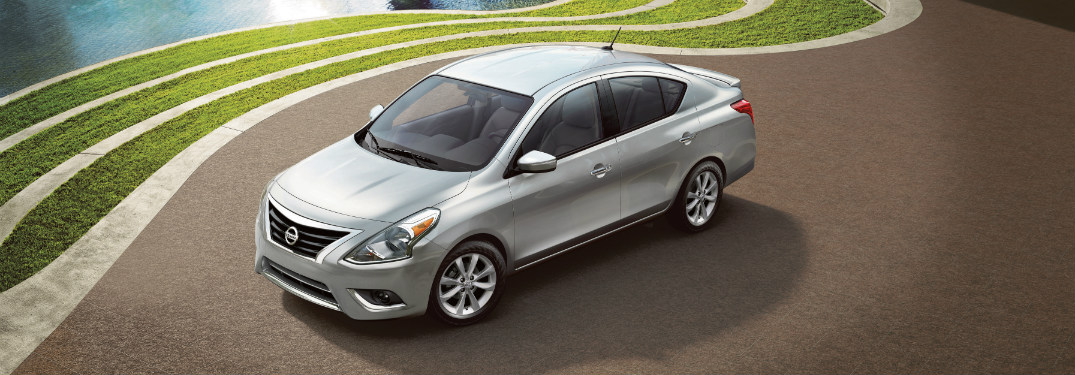 front and side view of silver 2018 nissan versa