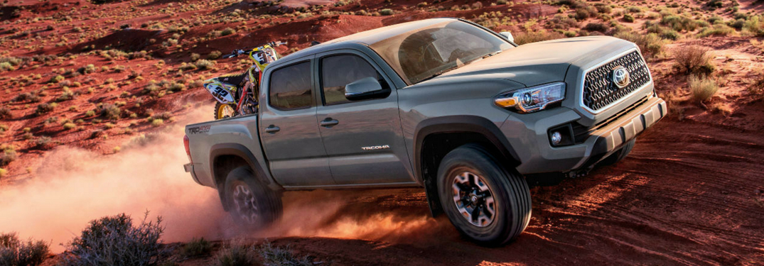 full view of 2018 tacoma driving in desert