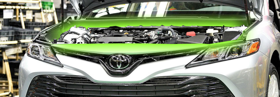 engine glowing from under the hood of 2018 toyota camry le