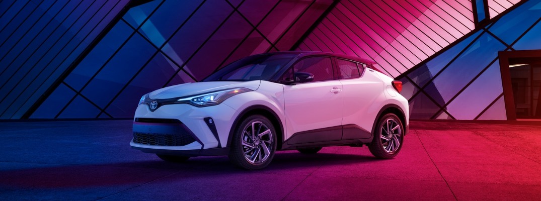 2020 Toyota C-HR parked against a red and blue background