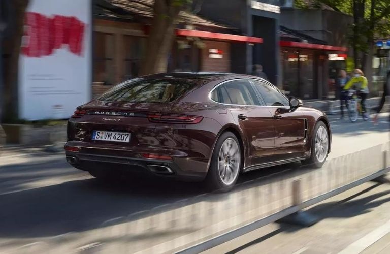 Exterior view of the rear of a maroon 2020 Porsche Panamera