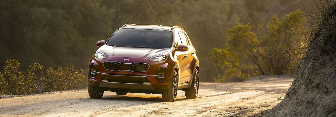 2020 Kia Sportage exterior front fascia driver side on dirt forest road