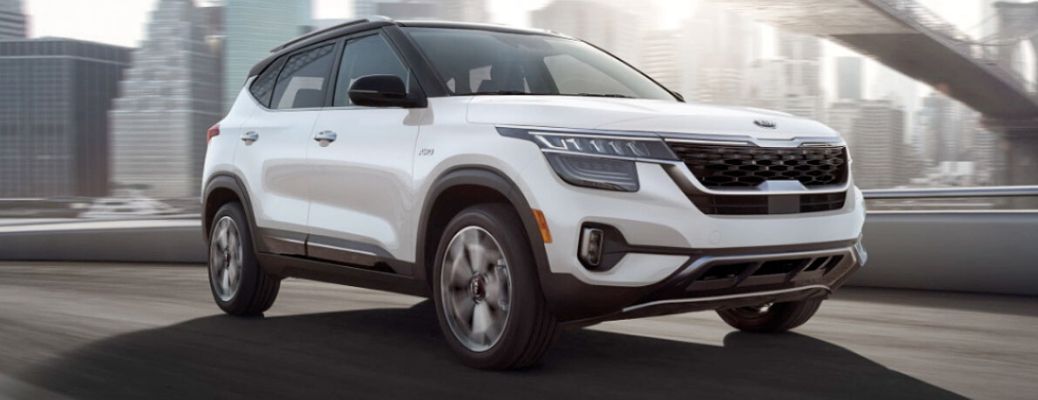 2021 Kia Seltos exterior front fascia passenger side on city highway
