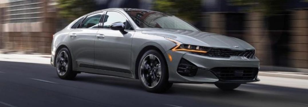 2022 Kia K5 exterior front fascia passenger side in city