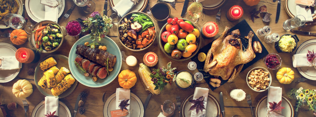 A stock photo of a table set for Thanksgiving.