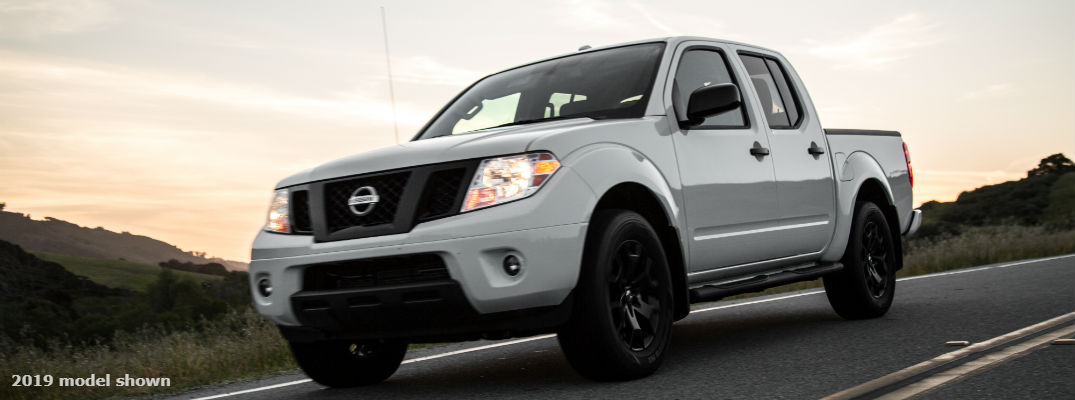 A front left profile photo of the 2019 Nissan Frontier on the road.