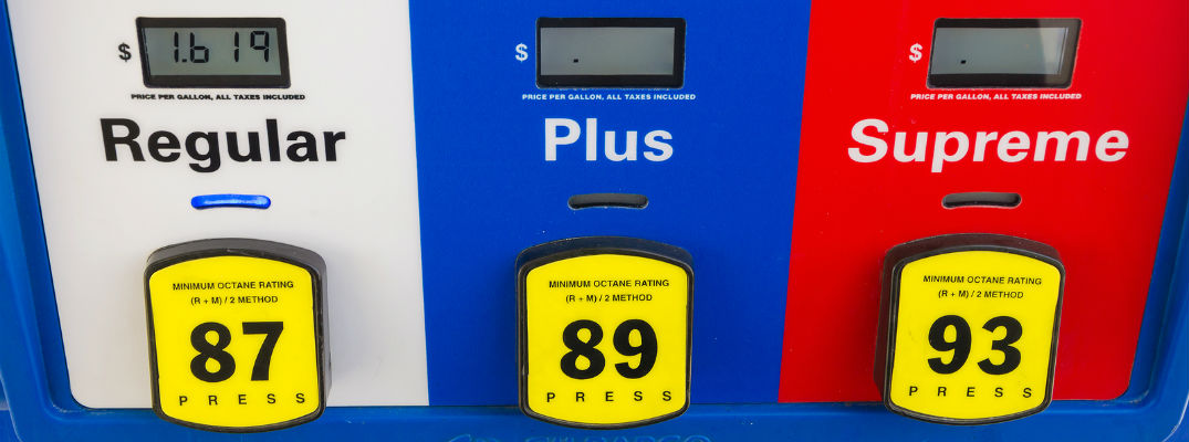 A stock photo of different kinds of fuel available at a gas station.