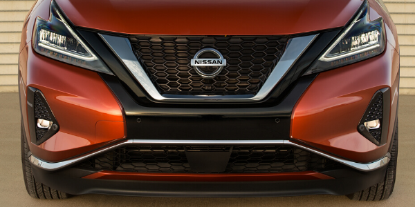 Front grille and LED headlights of orange 2020 Nissan Murano