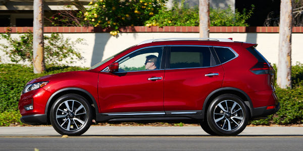Side view of red 2020 Nissan Rogue