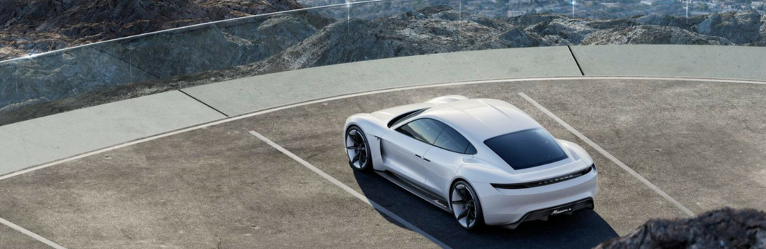 Porsche Taycan overlooking a mountain