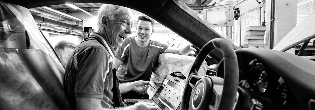 Porsche employees having a laugh