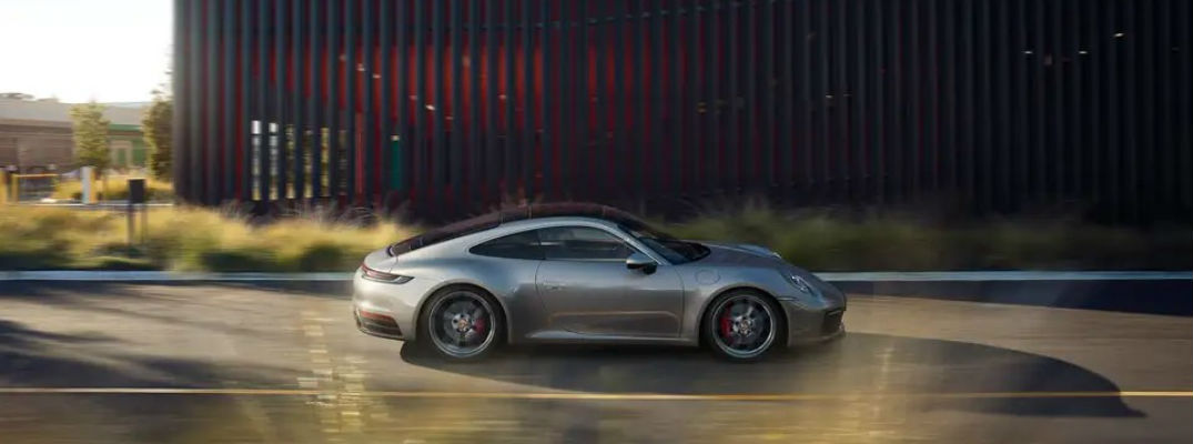 Grey 2021 Porsche 911 Targa 4 driving