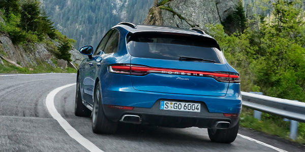 Rear view of blue Porsche Macan model