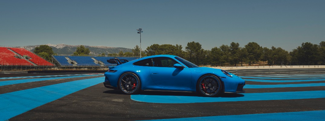 Profile view of blue 2022 Porsche 911 GT3