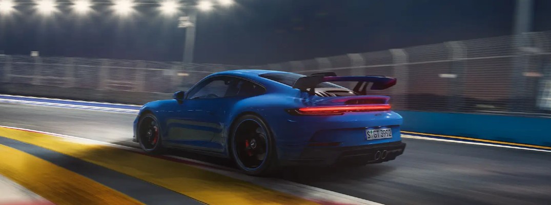Blue 2022 Porsche 911 GT3 on track