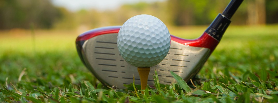 Golf ball and club closeup
