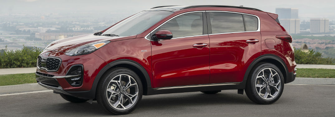 side view of a red 2020 Kia Sportage