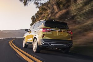 rear view of a yellow 2021 Kia Seltos