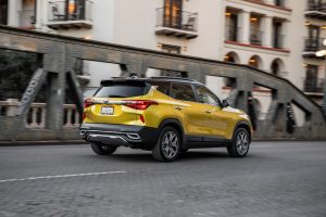 side view of a yellow 2021 Kia Seltos