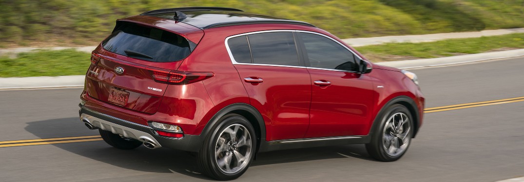 side view of a red 2021 Kia Sportage