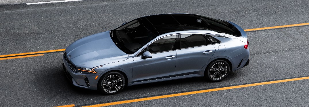 side view of a silver 2021 Kia K5