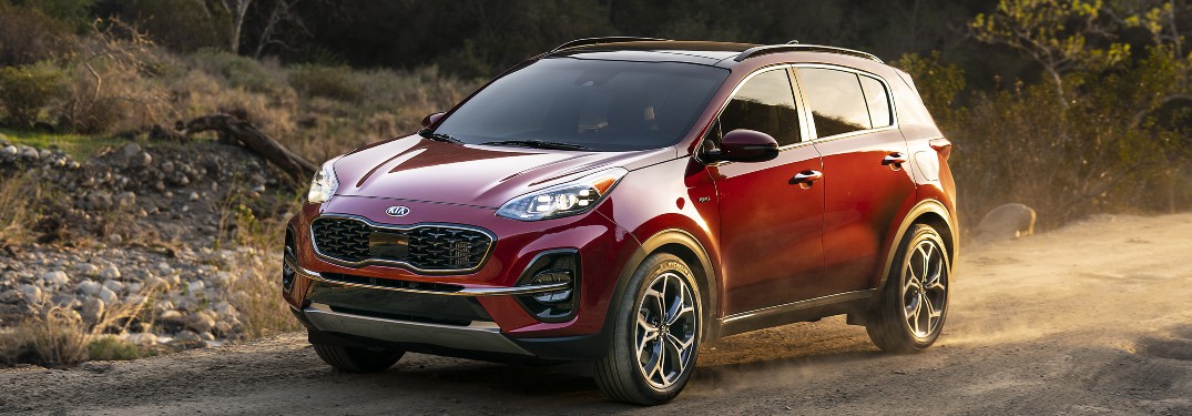 side view of a red 2021 Kia Sportage