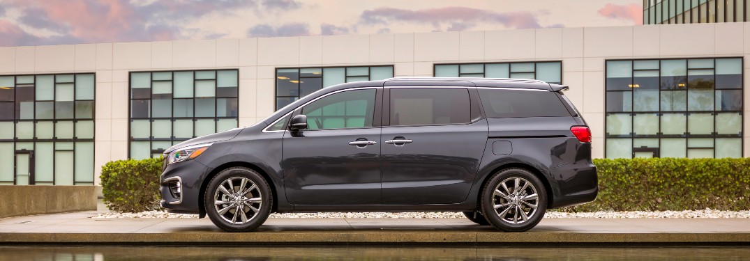 side view of a black 2021 Kia Sedona