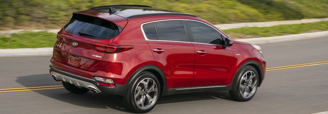 side view of a red 2021 Kia Sportage