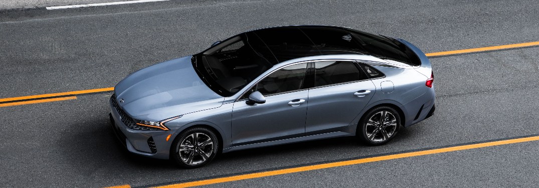 side view of a silver 2021 Kia K5