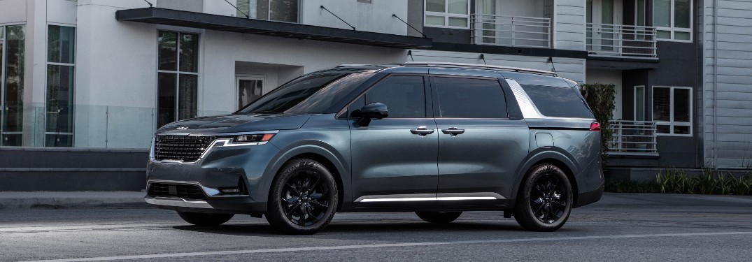 side view of a blue 2022 Kia Carnival