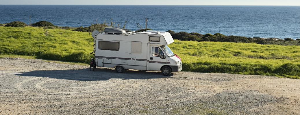RV by the beach and grass